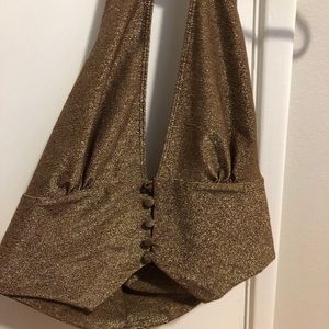 Metallic gold halter crop top.